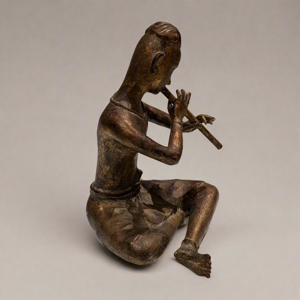 A Large Thai Gold-Gilt Bronze Flute Player, 20th Century