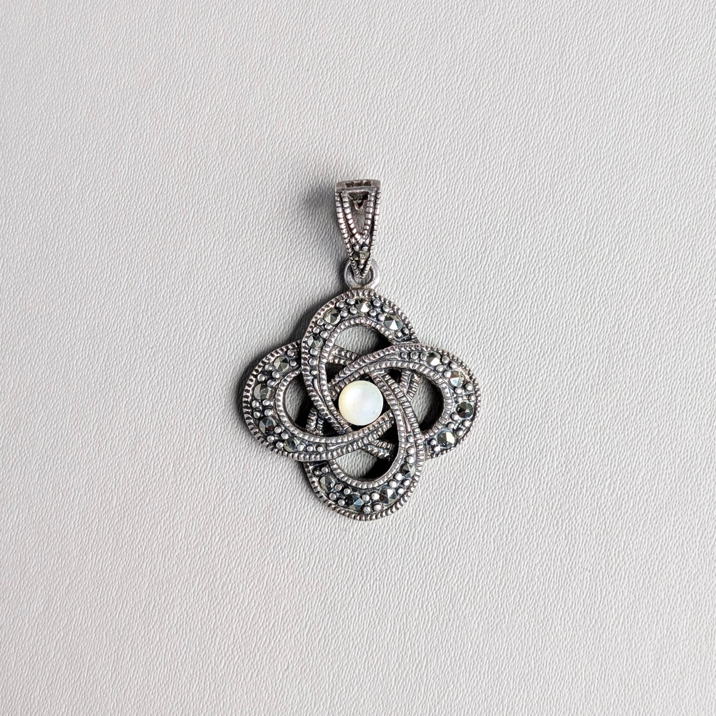 A Sterling Silver and Moonstone "Celtic Knot" Pendant