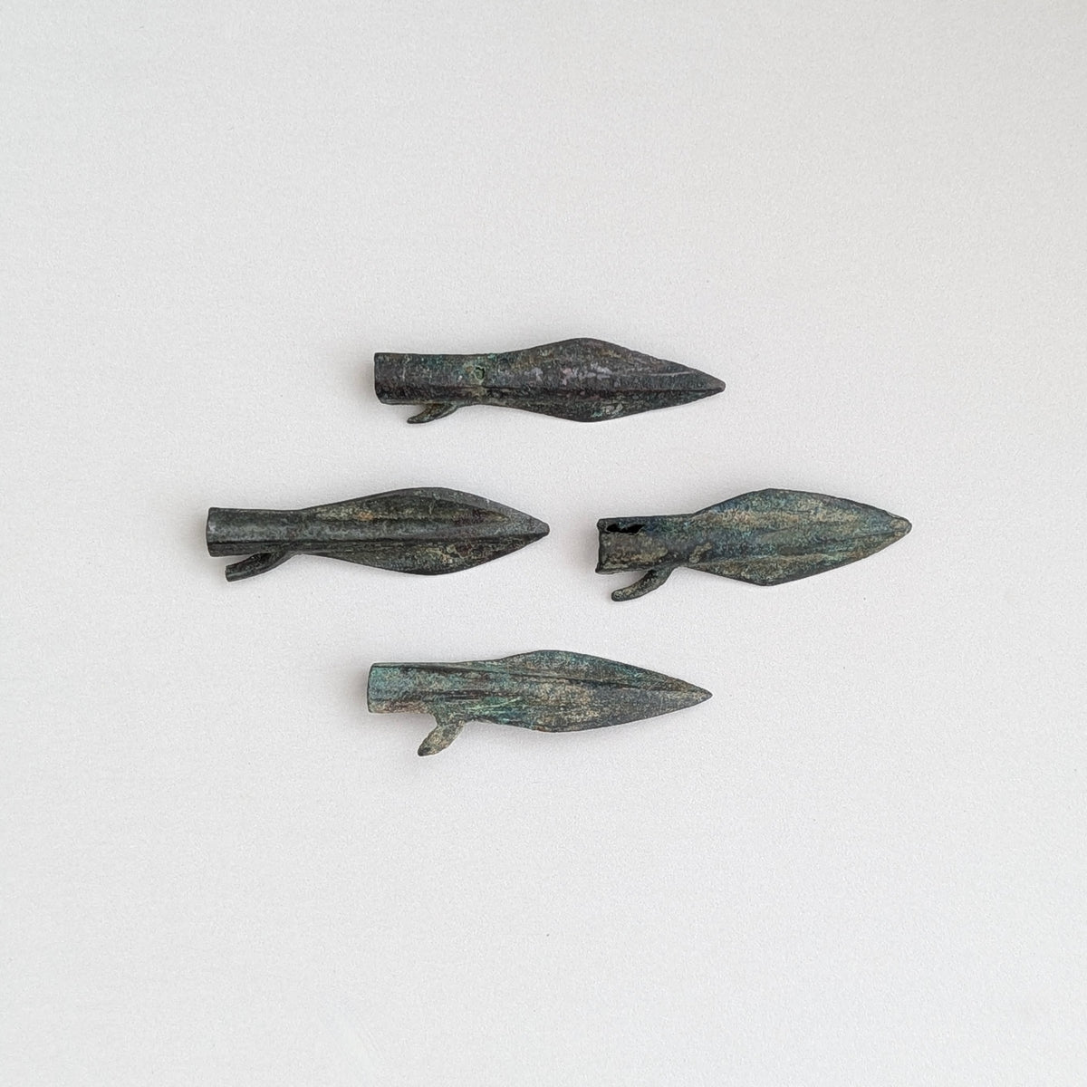 A Group of Four Ancient Scythian Bronze Arrowheads, circa 700-300 BC