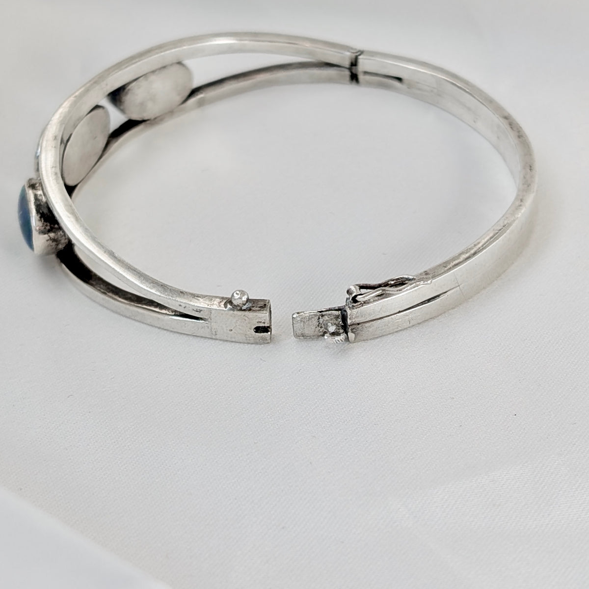 A Kranz & Ziegler Sterling Silver Australian Opal Bangle