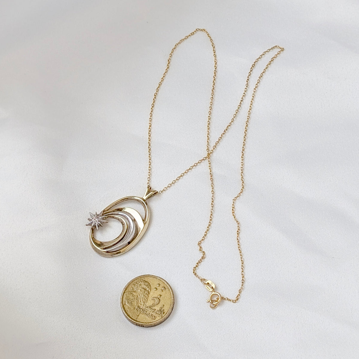 A Franklin Mint "Shooting Star" Diamond Pendant in Gold Plated Sterling Silver, 1985