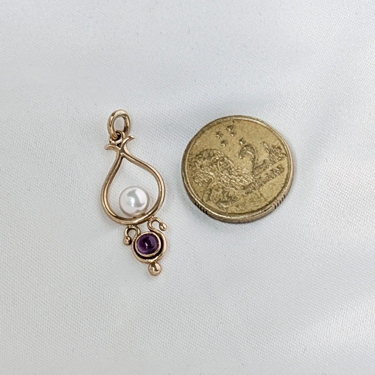 A 9ct Yellow Gold Akoya Pearl & Amethyst Pendant