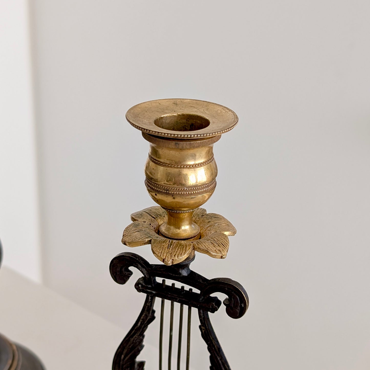A Pair of 19th Century Gilt Bronze "Lyre" Candle Holders