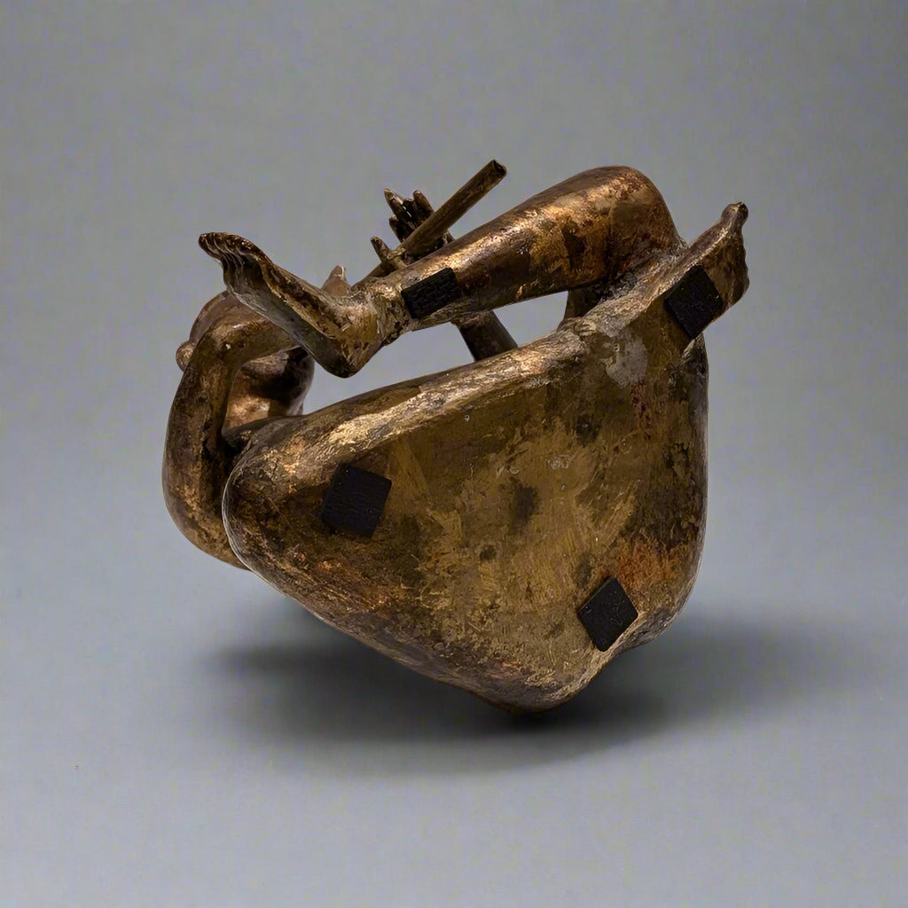 A Large Thai Gold-Gilt Bronze Flute Player, 20th Century