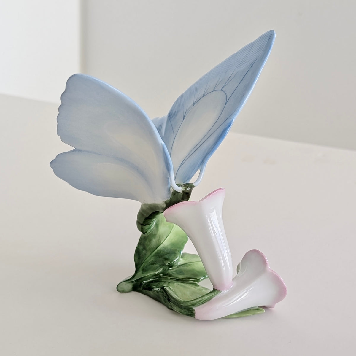 A Large HEREND Porcelain Blue Butterfly on Pink Flowers