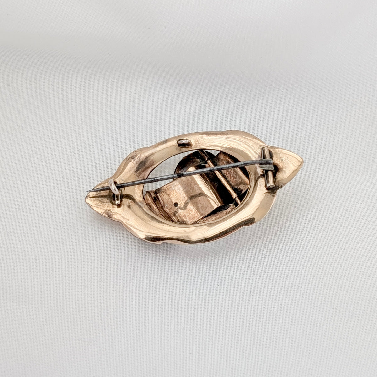 A Victorian 9ct Gold-Cased Turquoise "Buckle" Brooch, circa 1860