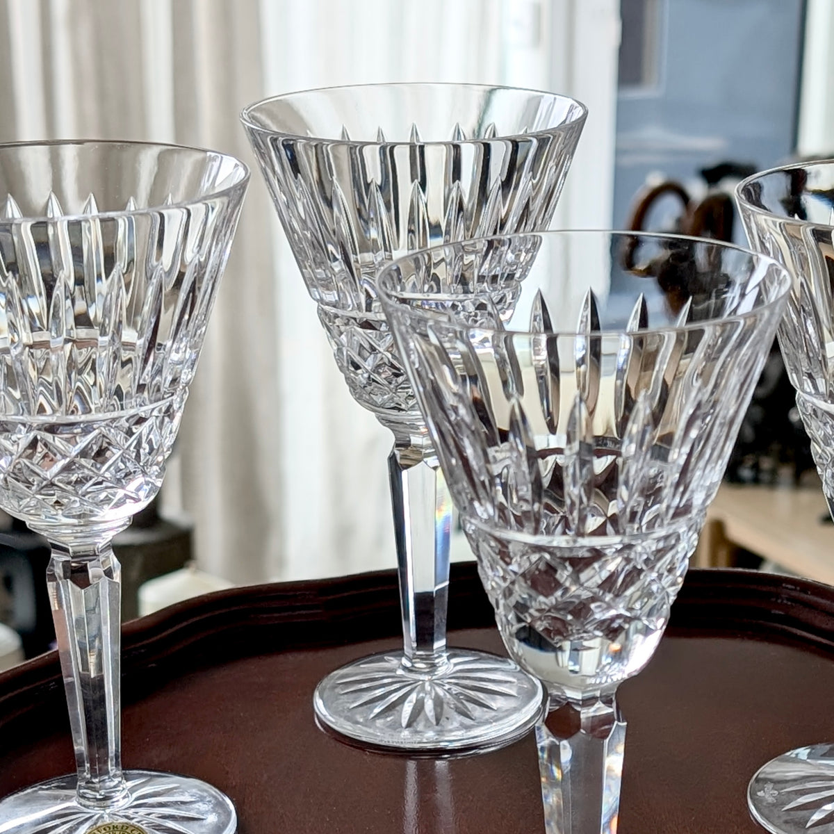 A Set of Four Waterford Cut Crystal "Maeve" White Wine Glasses