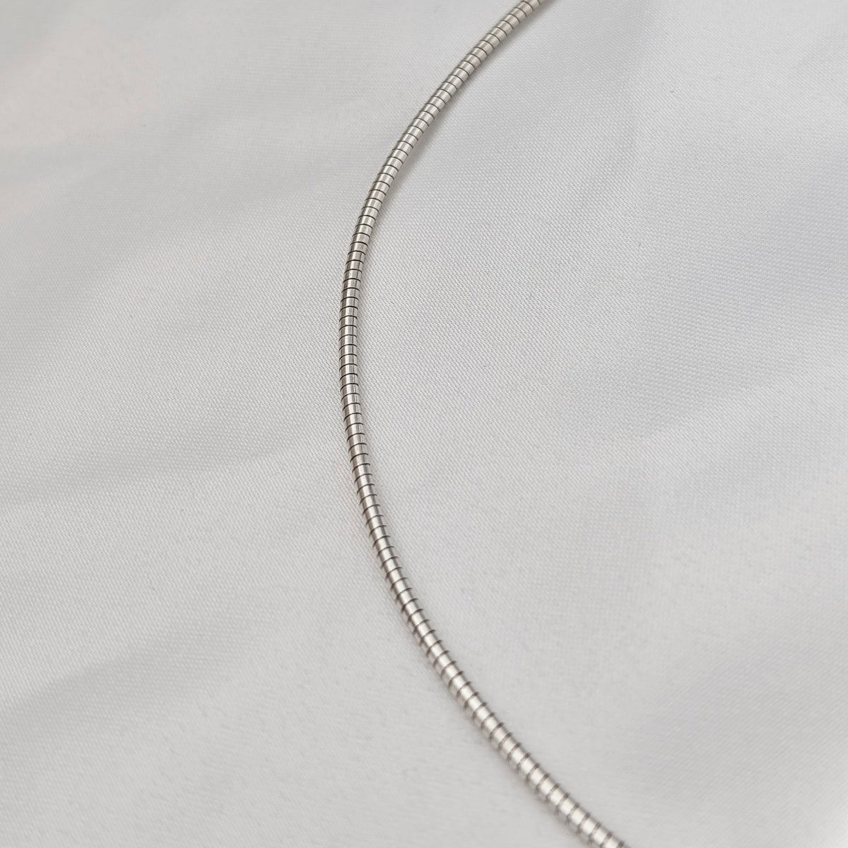 A Modernist Sterling Silver Pendant on Omega Chain