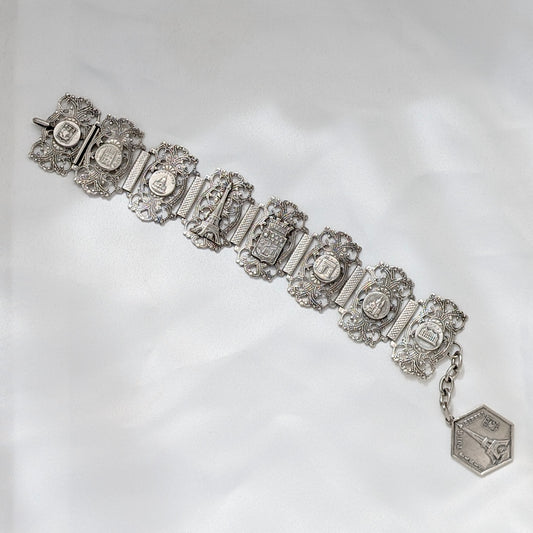 A Substantial French Parisien Travel Charm Bracelet in Silver Plate, circa 1940