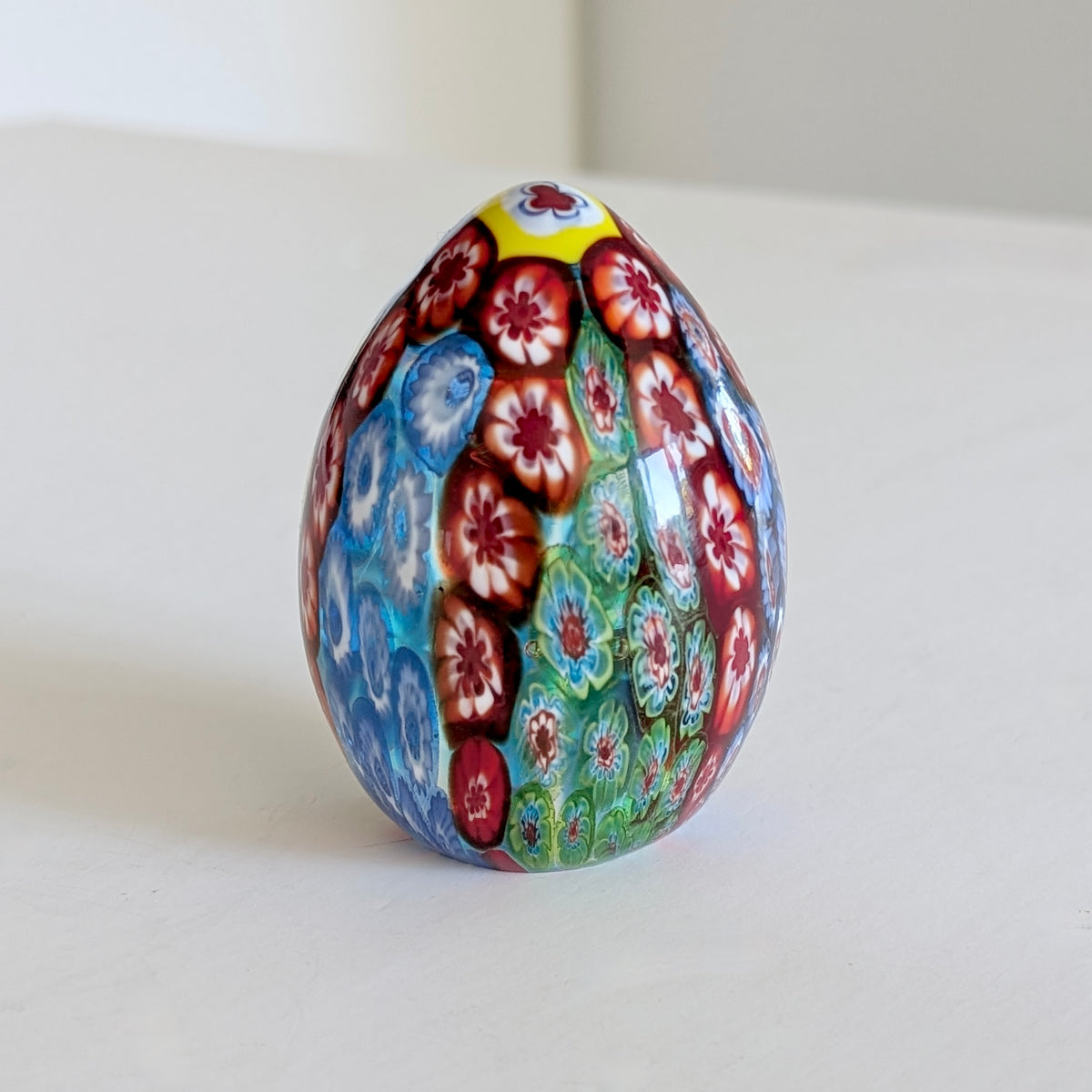 A Millefiori Egg-Shaped Glass Paperweight