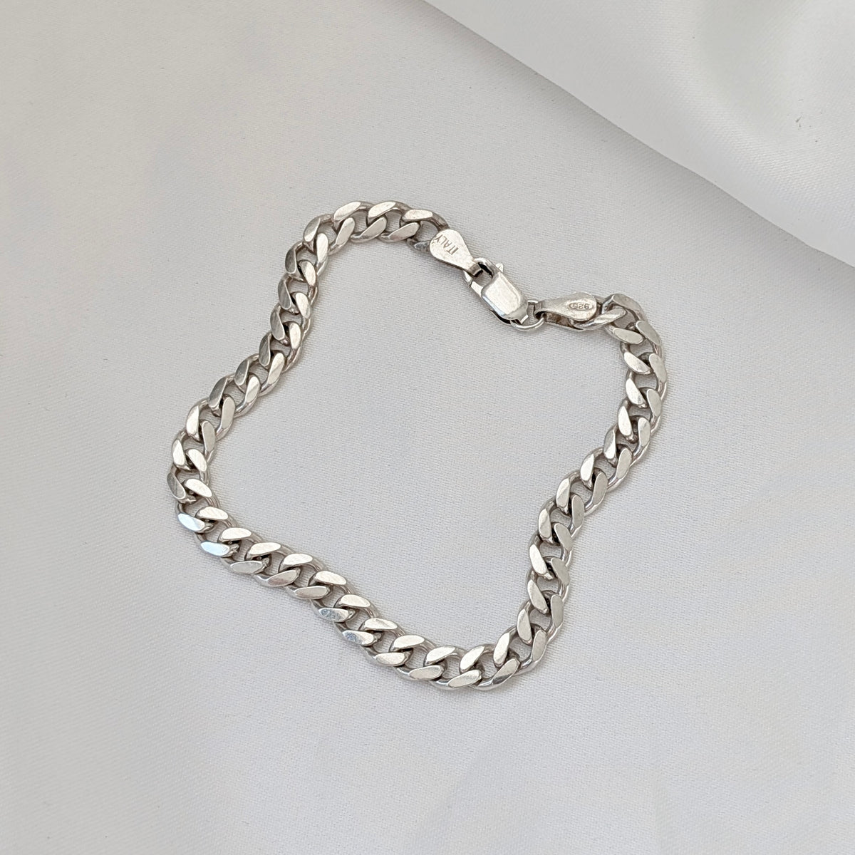 An Italian Sterling Silver Curb-Link Bracelet