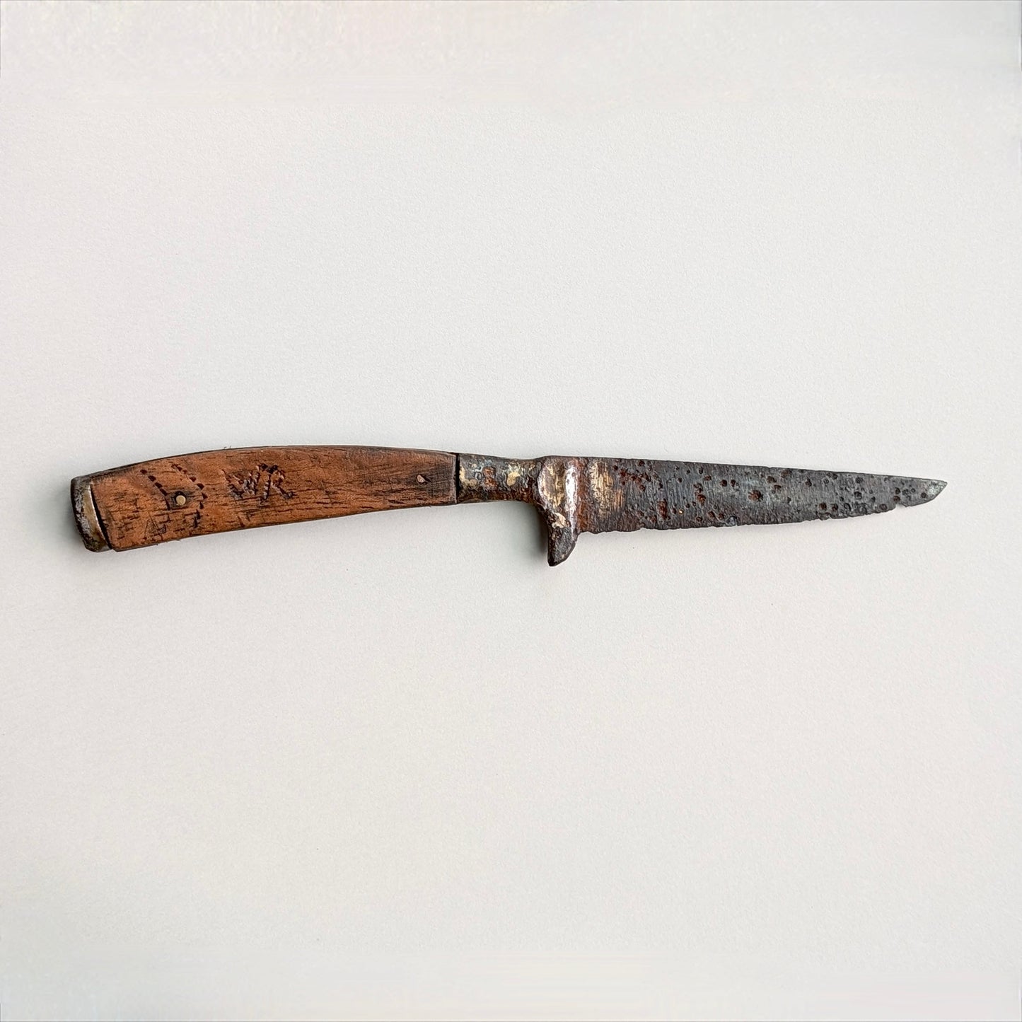 An Iron Scale-Tang Handle Knife, circa 1600