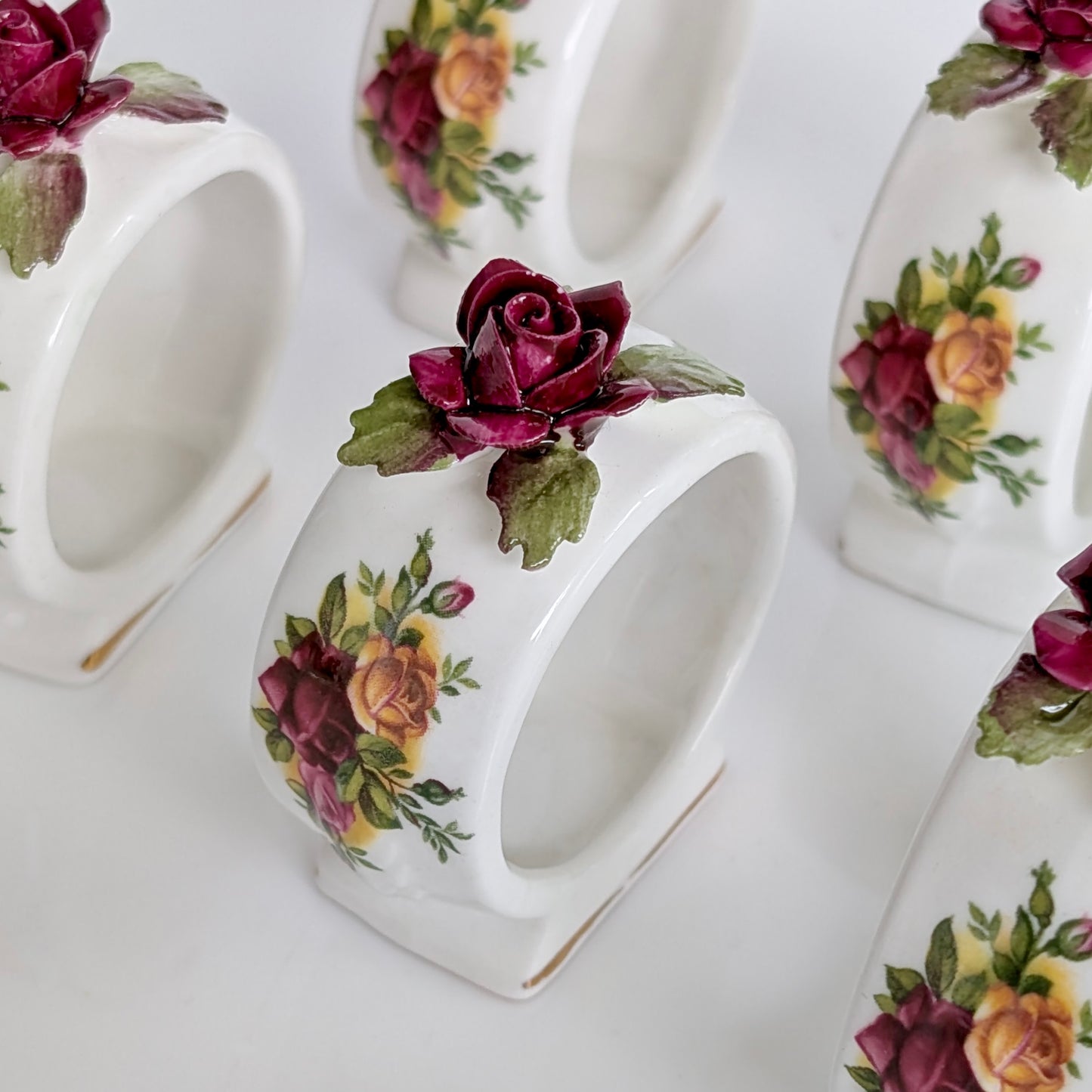 A Set of Six Royal Albert 'Old Country Roses' Napkin Rings
